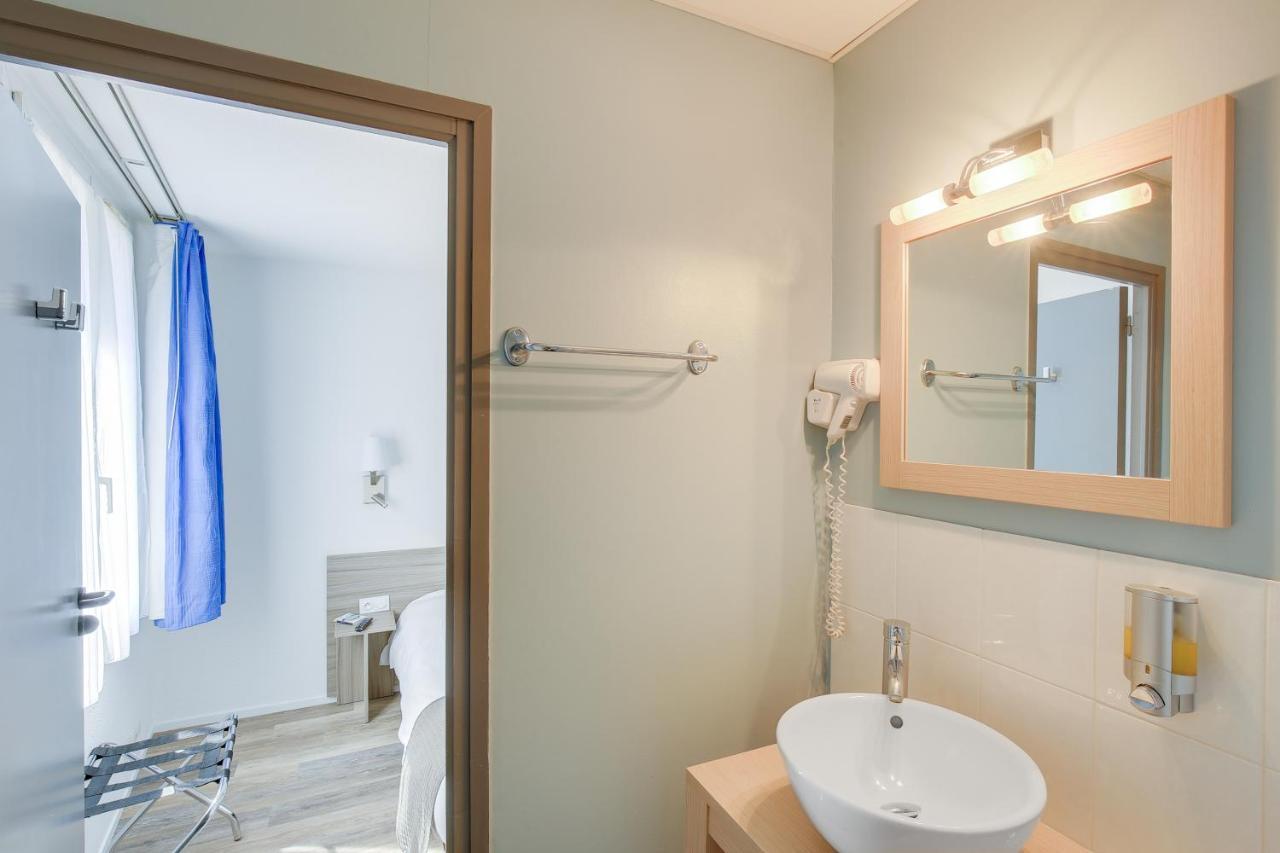 Contact Hotel Du Champ De Mars De 쎙브히육 외부 사진